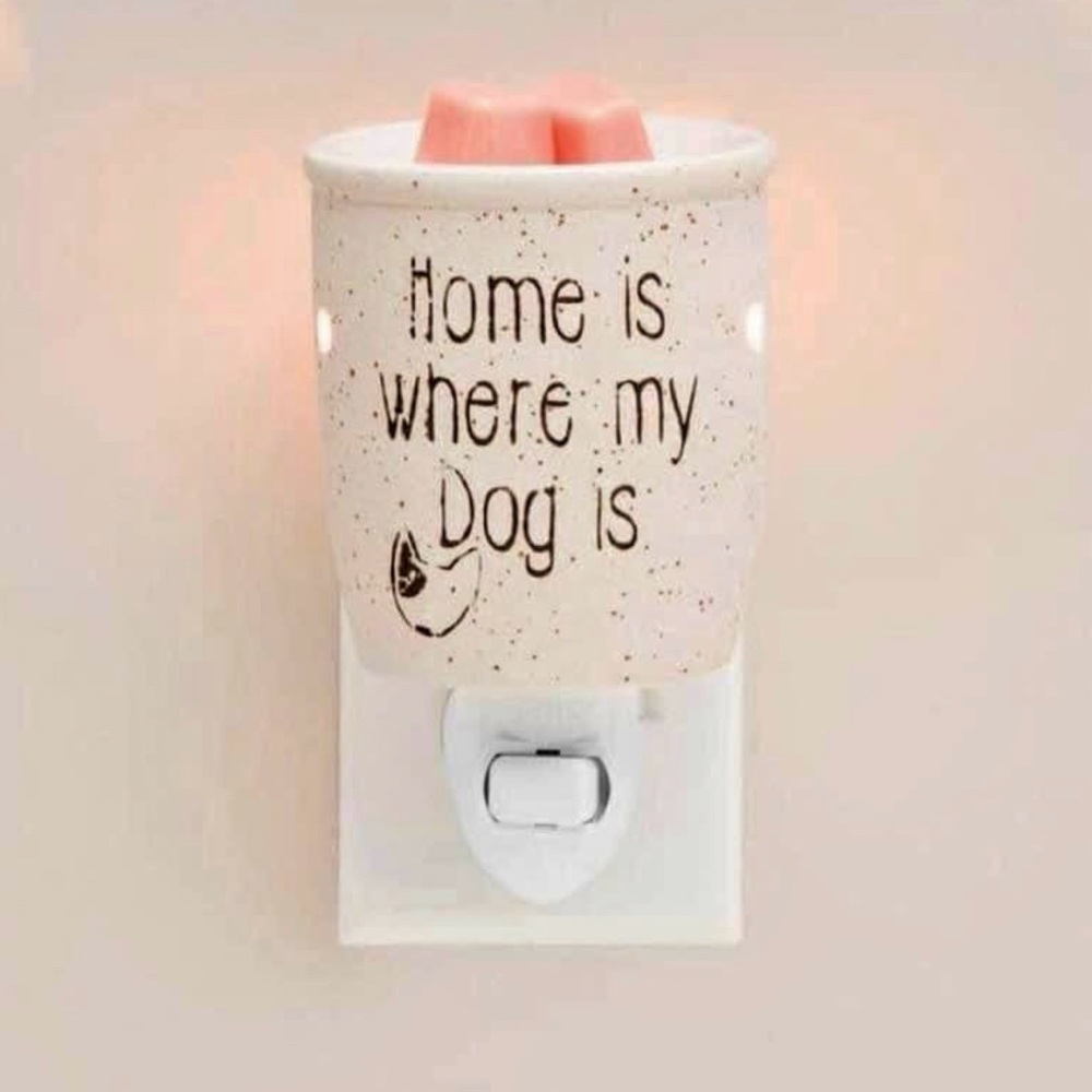 Scentsy mini wall plug in warmer. Home is where my dog is